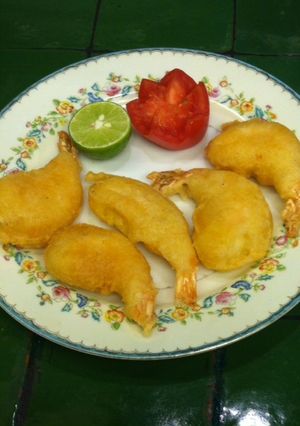 Una foto de Gambas con gabardina