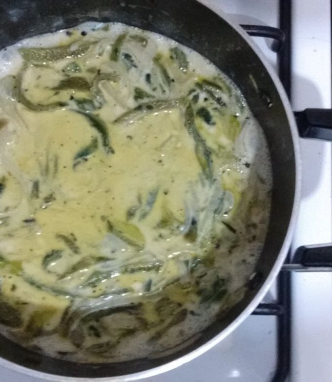 Una foto de Rajas con leche