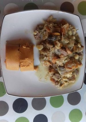 A picture of Moi moi with Irish potatoes sauce.