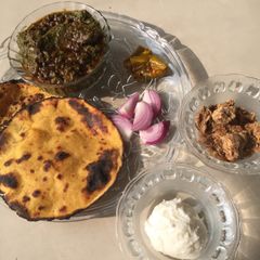 A picture of Makke ki roti sarsoan ka saag.