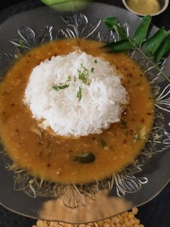कांदा कैरी आमटी (kanda kairi amti recipe in marathi) रेसिपी चे मुख्य फोटो 