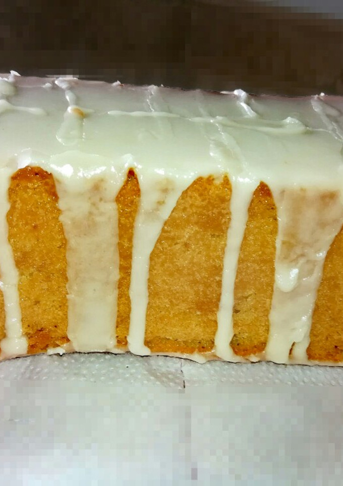 Una foto de Budín de vainilla con glaseado de naranja