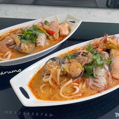 A picture of Creamy Tom Yum Udon Seafood.