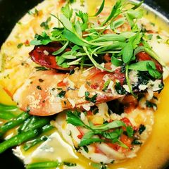 A picture of Prawns with chili lime butter sauce.
