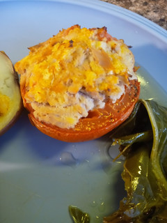 A picture of Roasted Tuna Stuffing in a Tomato.