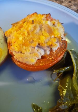 A picture of Roasted Tuna Stuffing in a Tomato.