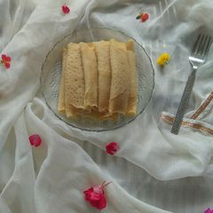 A picture of Patishapta/ Bengali Pancake Roll.