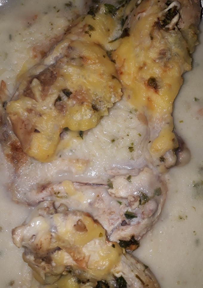 Una foto de Pollo dorado al queso