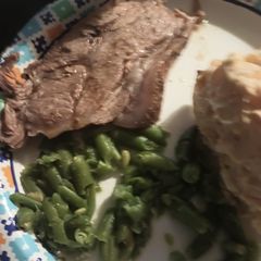 A picture of Roasted Pork Roast with Onions.