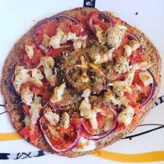 Una foto de Pizza fit sin hidratos base quinoa