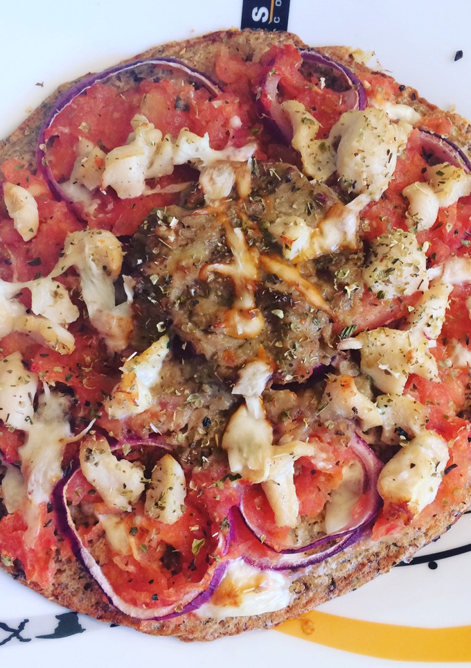 Una foto de Pizza fit sin hidratos base quinoa