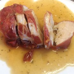 A picture of Turkey in Parma Roulade with Sage & Onion Gravy.