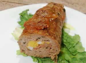 Foto di Polpettone ripieno con Mortadella, Uova Sode e Scamorza Affumicata al Forno