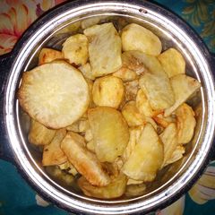 Fried Irish and sweet potatoes A picture of Fried Irish and sweet potatoes.