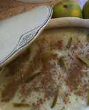 Arroz con leche y piel de naranja confitada