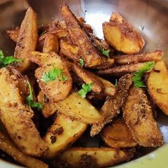 A picture of Potato wedges.