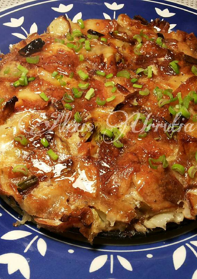 Una foto de Pastel de tortilla de patatas chips al horno