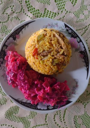 Una foto de Arroz de sardina con ensalada de payaso