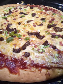 A picture of Chicago cheese steak pizza.