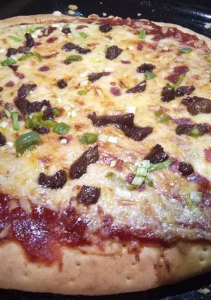 A picture of Chicago cheese steak pizza.