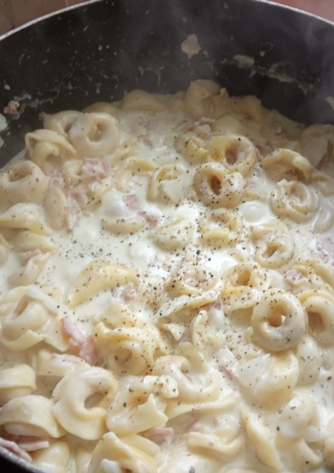 Una foto de Raviolis con nata