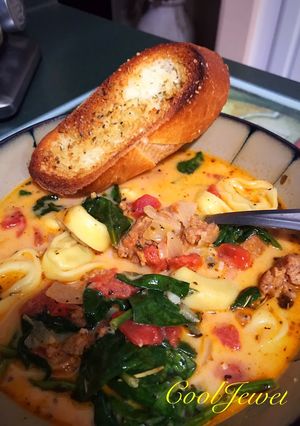 A picture of Creamy Tuscan Sausage Tortellini Soup (Crockpot).