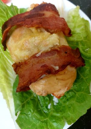A picture of My Chicken breast with Brie and Streaky bacon wrapped around. 😋.