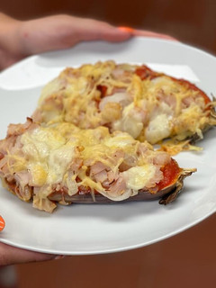 Una foto de Berenjenas tipo pizza en microondas