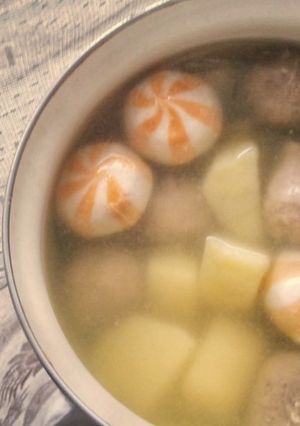 A picture of Potato Meatballs and Cheese Dumpling Clear Soup.