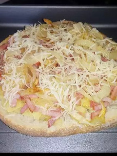 Una foto de Hogaza pizza de chicote 🤣🤣