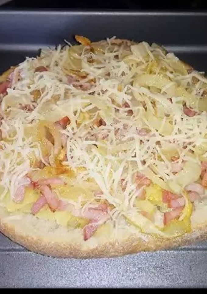 Una foto de Hogaza pizza de chicote 🤣🤣
