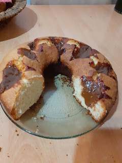 Una foto de Budín de coco y dulce de leche