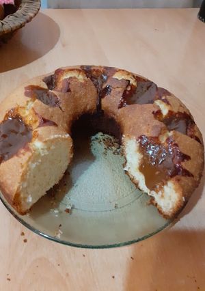 Una foto de Budín de coco y dulce de leche