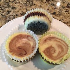 A picture of Fudge Swirled Oreo Bottom Cheesecake Cupcakes.