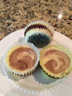 A picture of Fudge Swirled Oreo Bottom Cheesecake Cupcakes.