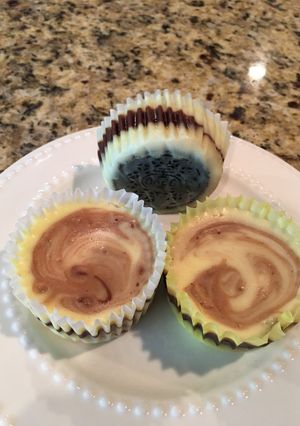 A picture of Fudge Swirled Oreo Bottom Cheesecake Cupcakes.