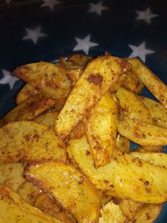 Una foto de Patatas al horno especiadas🥔