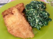 Una foto de guarnición de milanesa de pollo