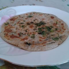 A picture of Paneer lachha paratha.