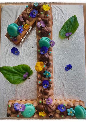 Une photo de Number cake ganache montée kinder