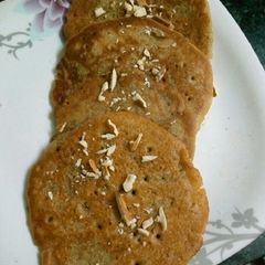 A picture of Wheat jaggery malpua.