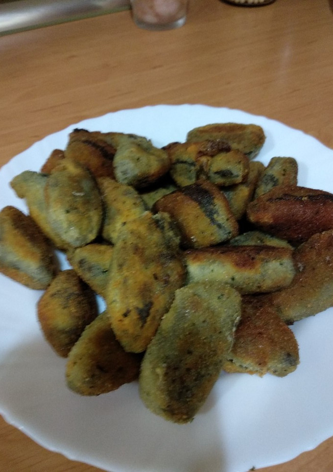Una foto de Croquetas de bacalao con tinta de calamar