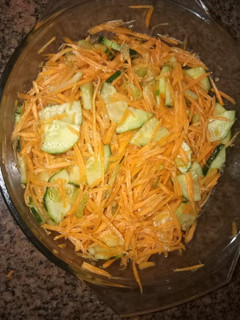 A picture of Cucumber,celerystem and carrot salad #Author marathoni.