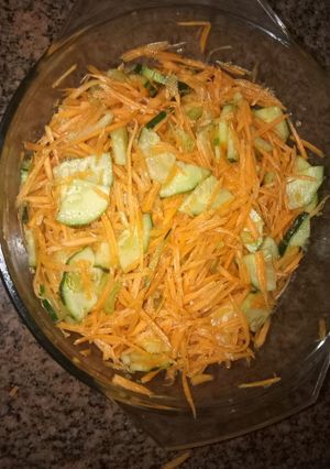 A picture of Cucumber,celerystem and carrot salad #Author marathoni.