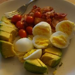 A picture of Egg, avacodo bacon breakfast.