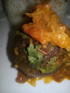 A picture of Omena balls in coconut sauce.