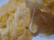 Una foto de polenta con queso