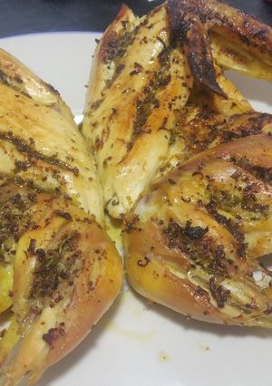 A picture of Flat brined roast chicken with lemon and herbs.