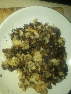 Una foto de Coliflor frita con morcilla