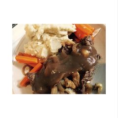 A picture of Beef steak with mashed potato.